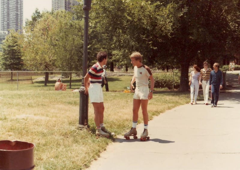 Jean de Cruz and Greg Reichman roller skating
