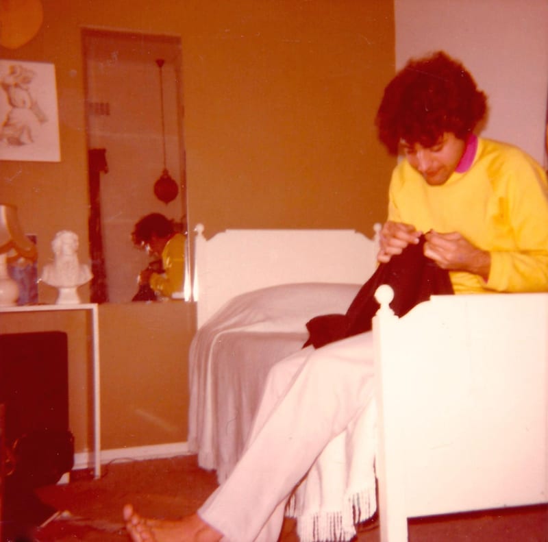 Henry sewing Steven's dress